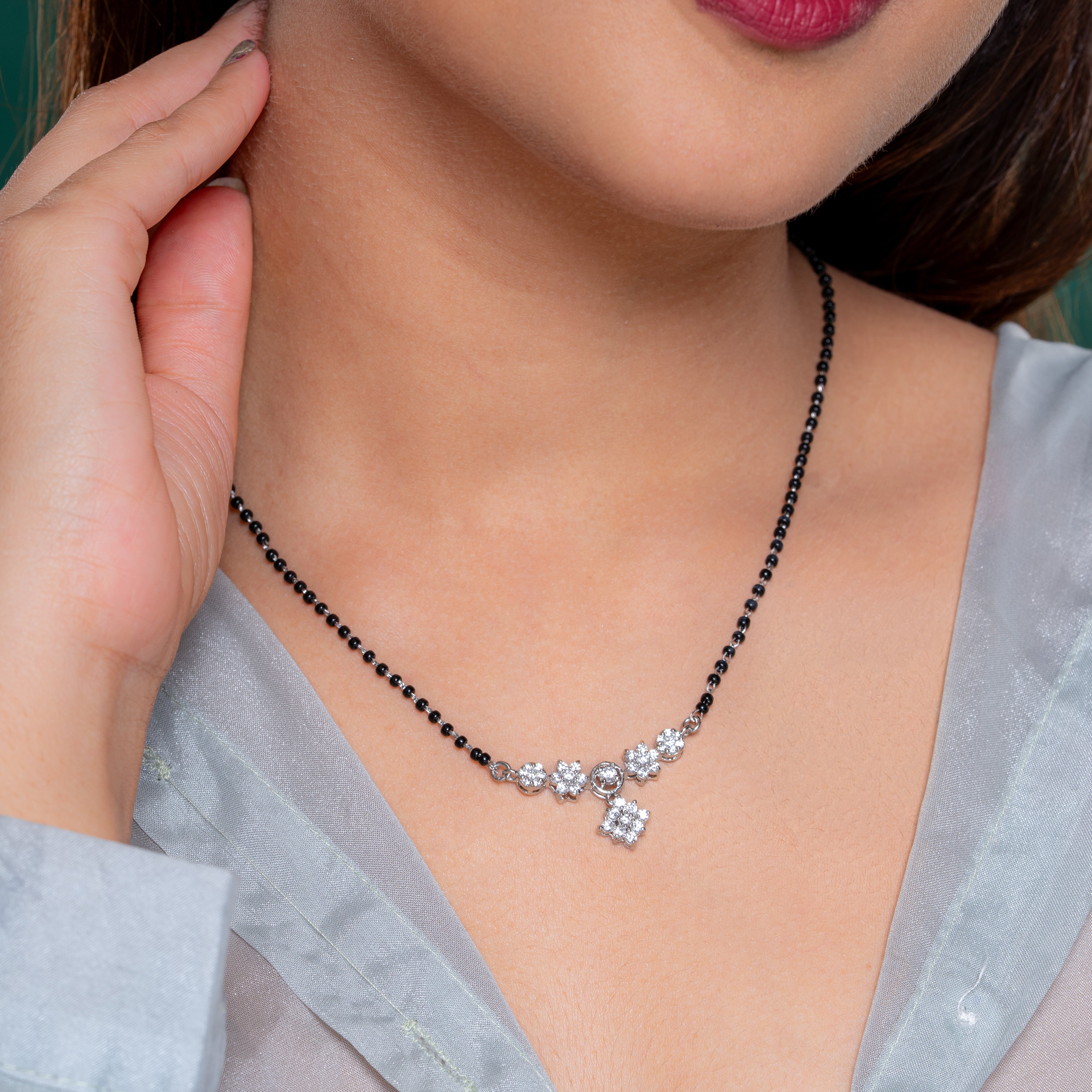Reegalia  925 sterling silver mangalsutra set, featuring a delicate fusion of tradition and modern charm.