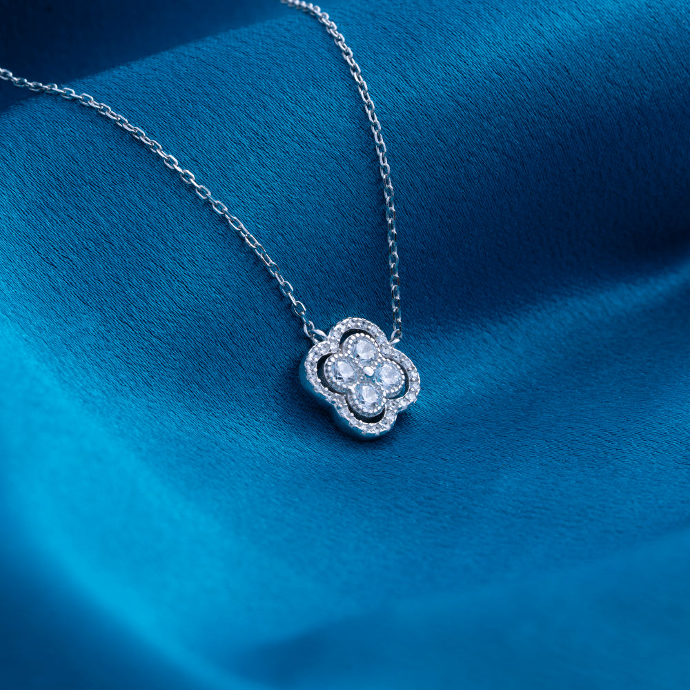 Reegalia Sterling Silver Petite Clover Bloom Necklace.