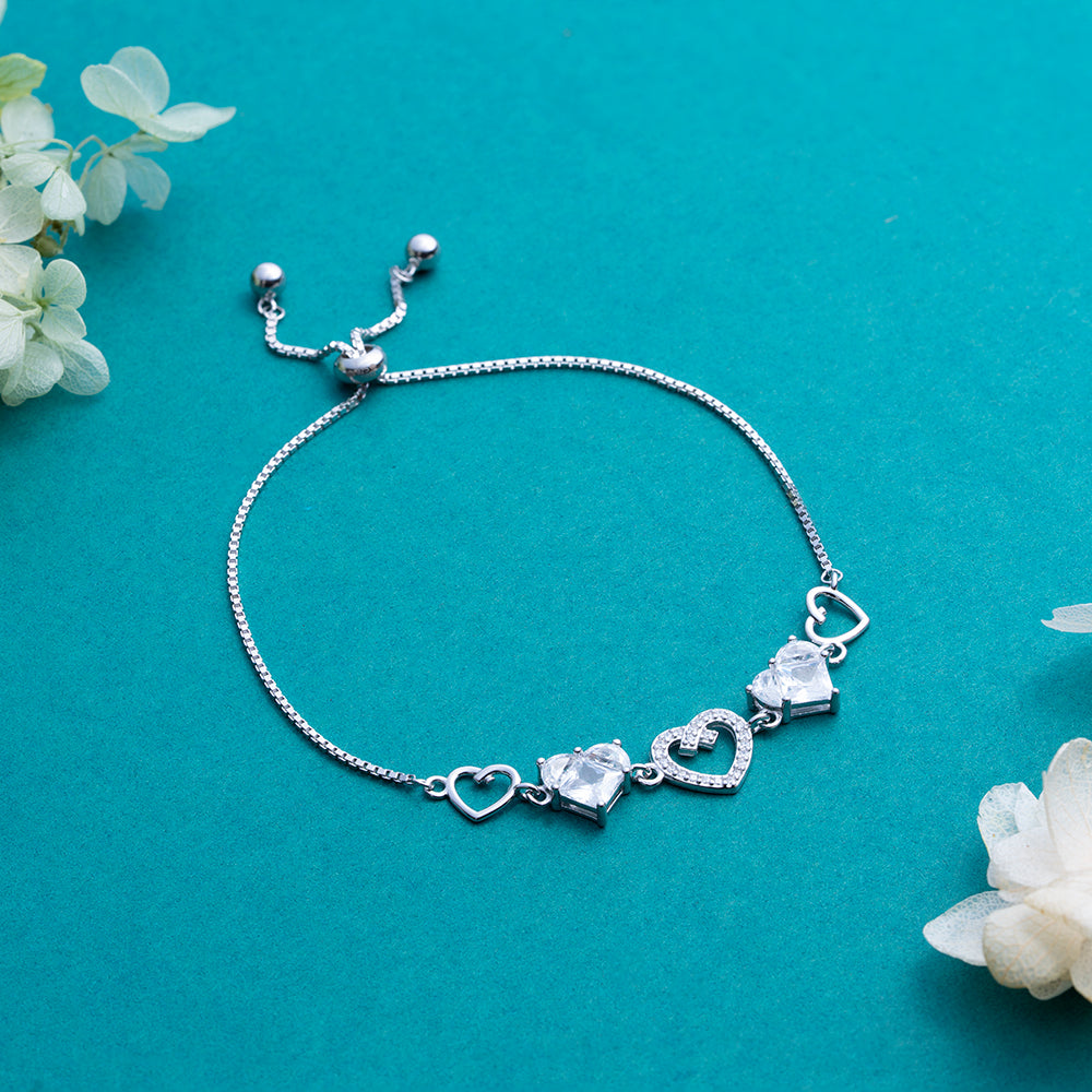Reegalia Sterling Silver Linked Hearts CZ Bracelet.