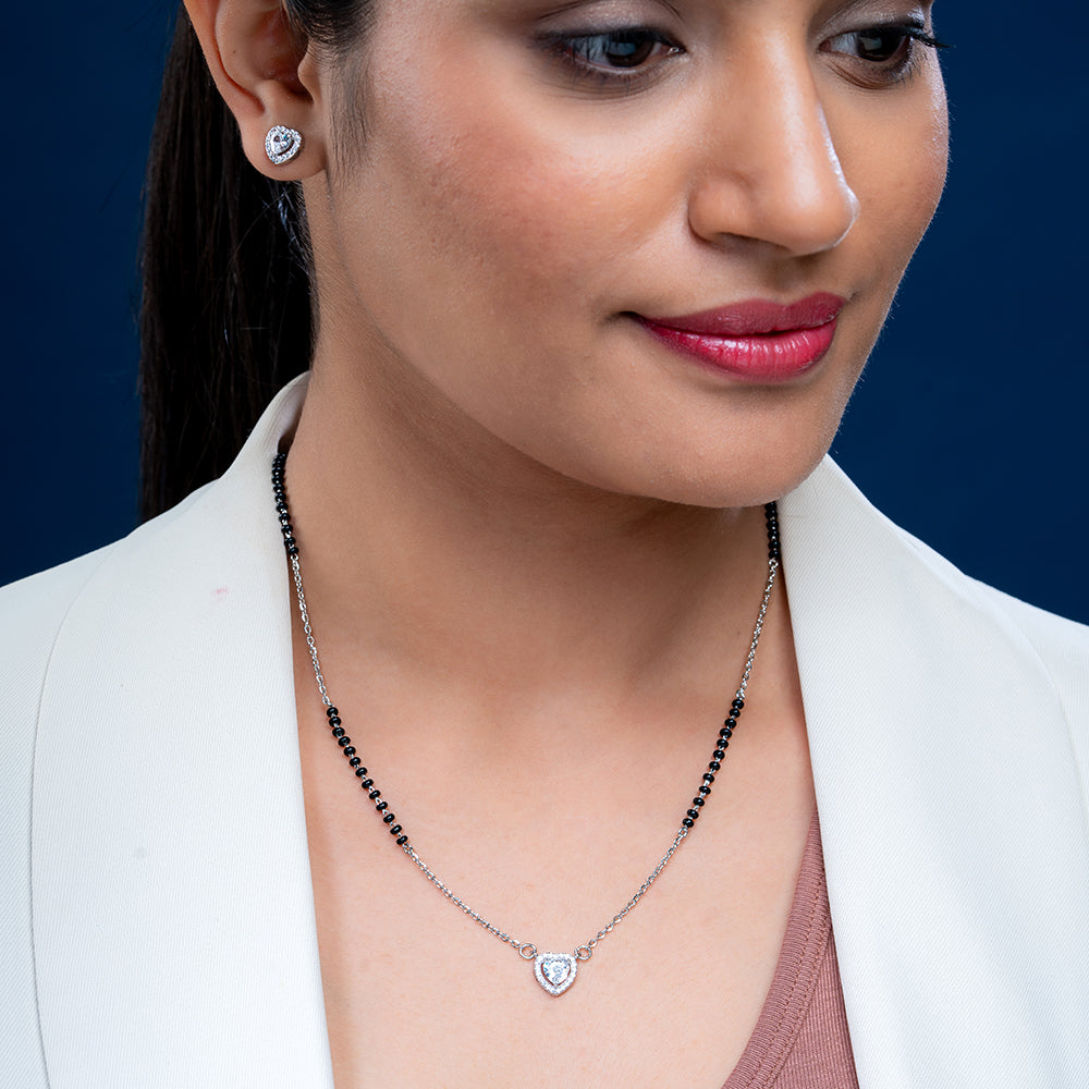 Reegalia Heart Halo Mangalsutra Bracelet & Stud Earrings Set.