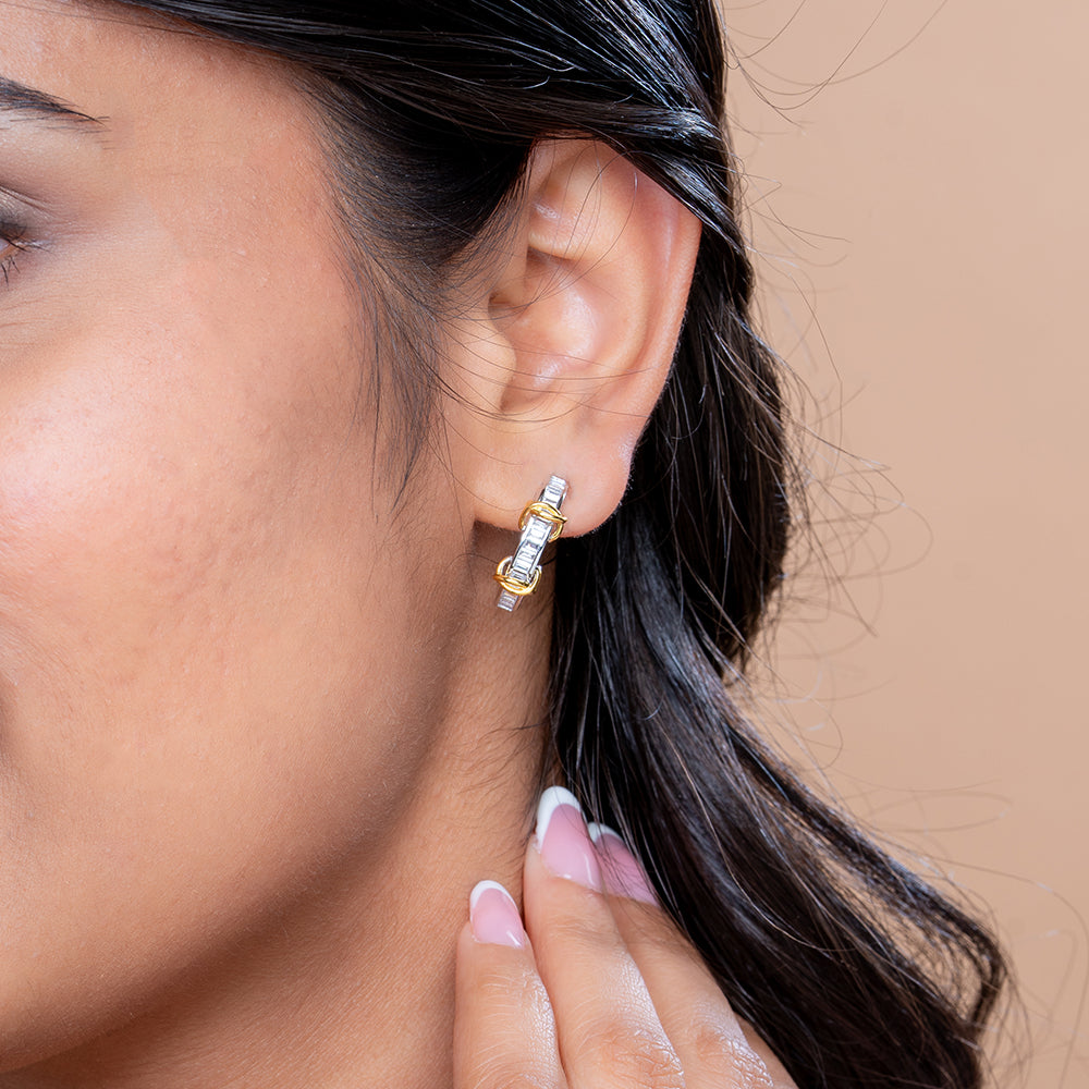 Reegalia Baguette Glow Huggie Earrings in 925 Silver.